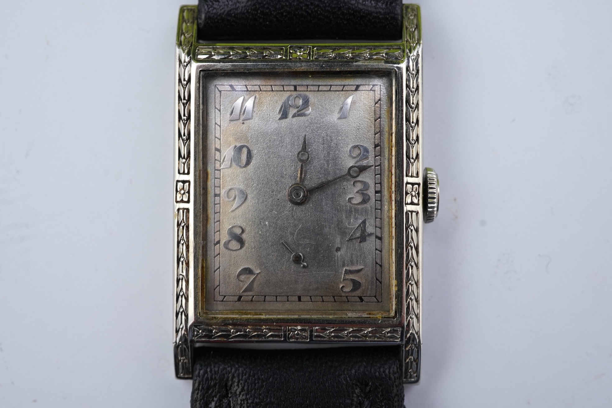 A lady's 18k white gold International Watch Company manual wind wrist watch, on a later associated leather strap